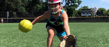 Camper with facemask watches the ball carefully